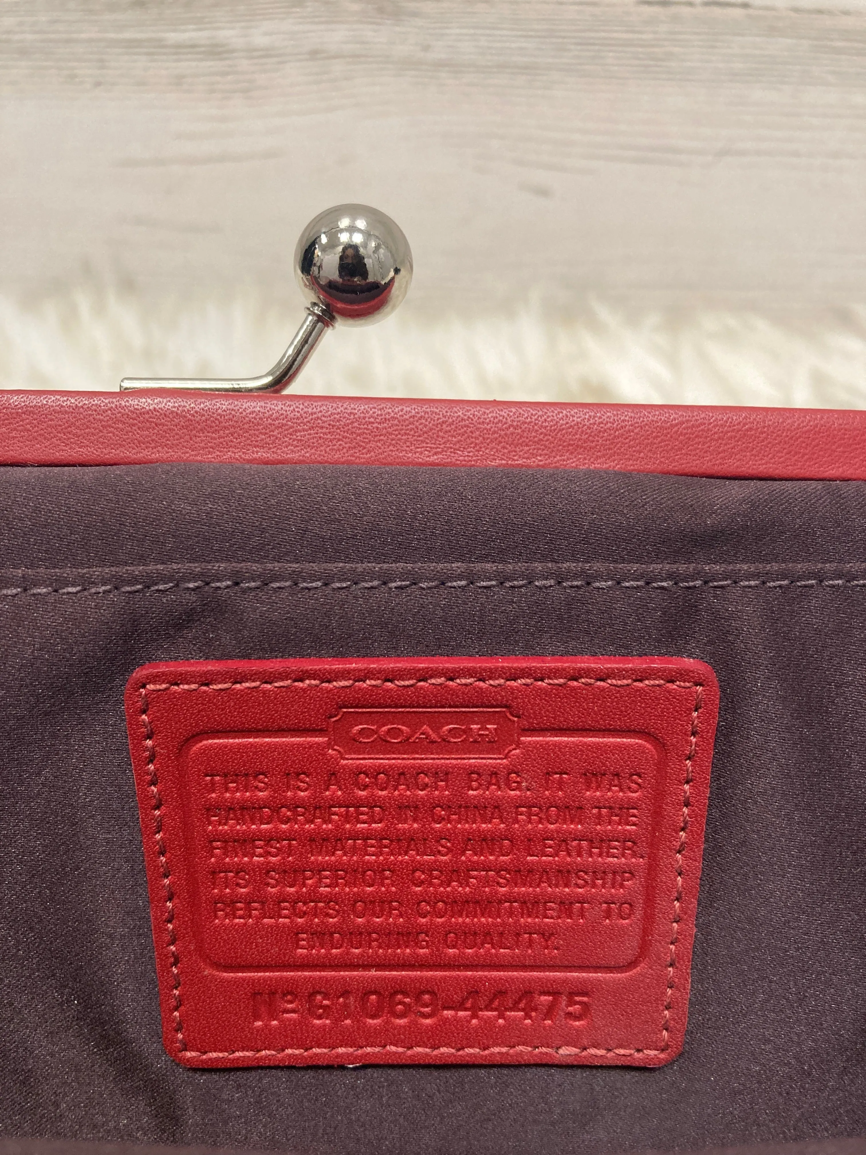 Clutch Designer By Coach  Size: Medium