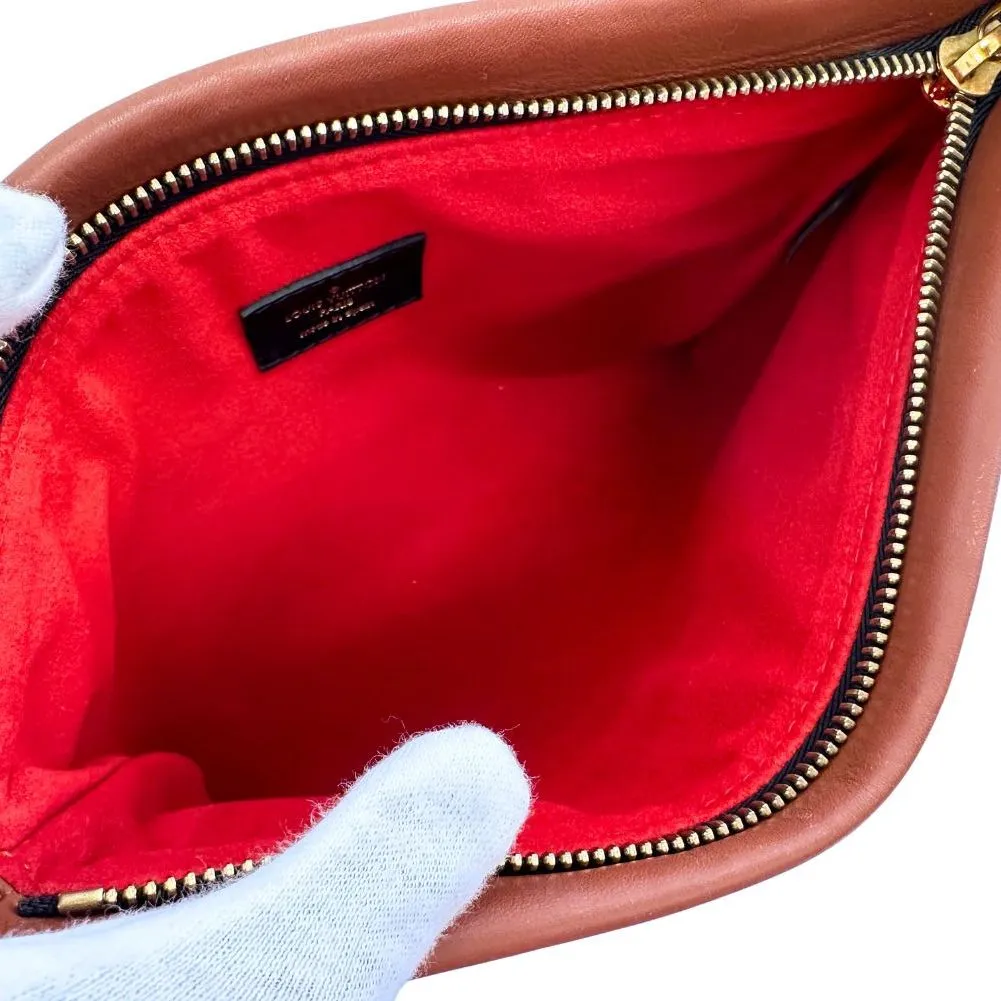 Louis Vuitton Tuileries  Canvas Clutch Bag ()