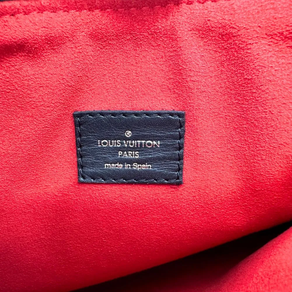 Louis Vuitton Tuileries  Canvas Clutch Bag ()